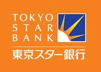 The Tokyo Star Bank logo displayed on an orange background, featuring the bank’s name in English and Japanese alongside a blue and yellow star emblem.