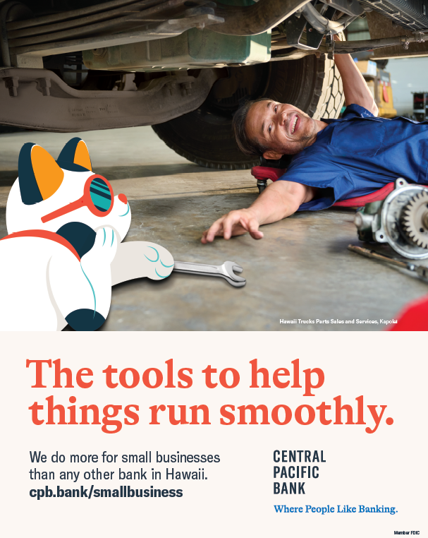 A Central Pacific Bank advertisement features an auto mechanic working beneath a truck while a cartoon cat wearing sunglasses holds a wrench in the foreground. The ad includes the text, “The tools to help things run smoothly,” and promotes small business banking services in Hawaii.